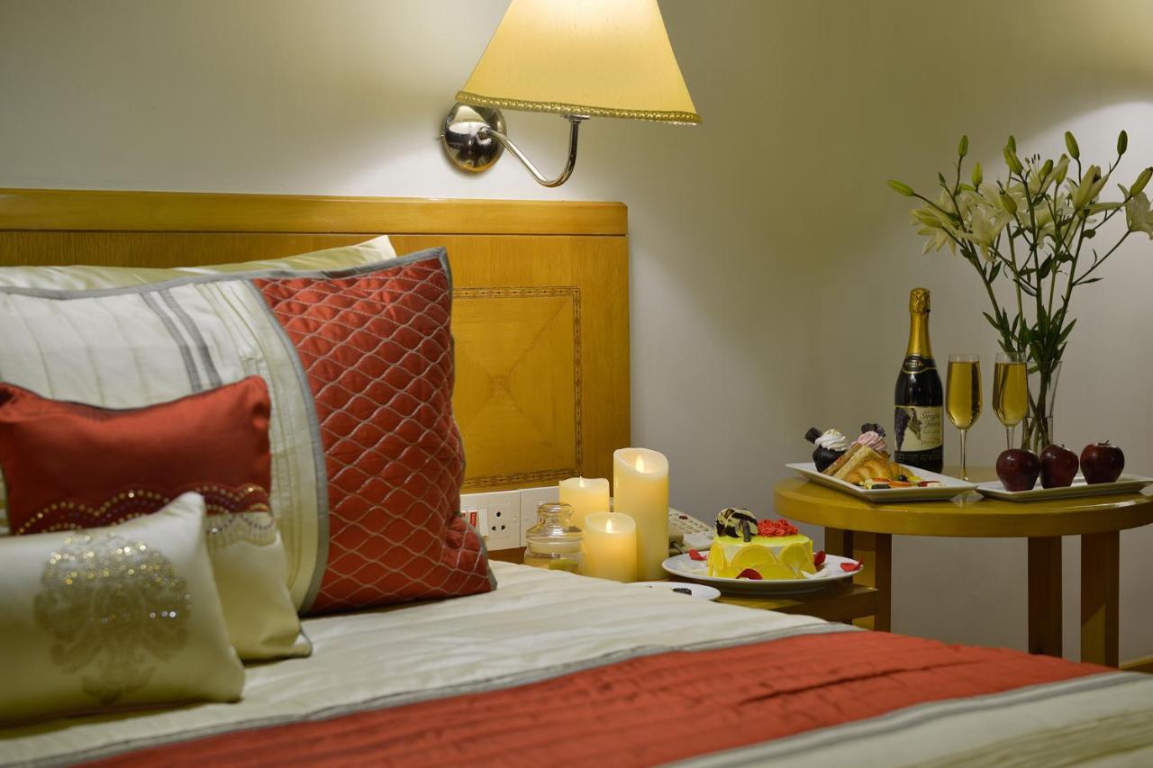 Deluxe Suite Queen Bed with City View,1001441340:JPEG