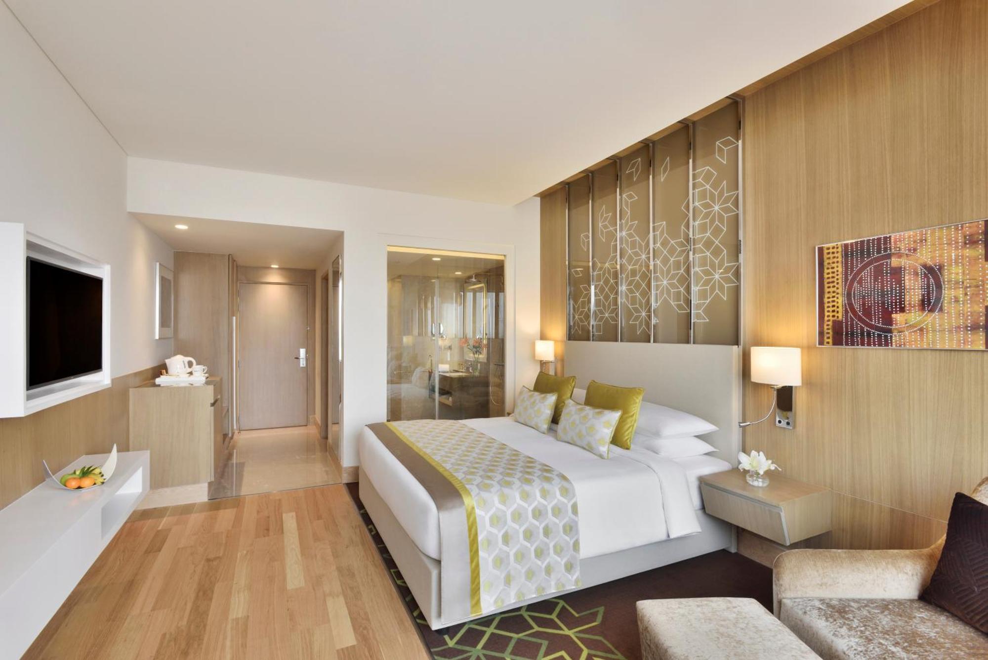 Deluxe Room with 15% off on F&B, 1+1 IMFL Happy Hours, 15% off on Spa, Early Check-in by 11 AM & Late check-out by 3 PM (Subject to avl) & 2 Pieces Laundry (Washing & Ironing)Credit worth INR 500 redeemable on Food & Soft Beverages, with min spend of
