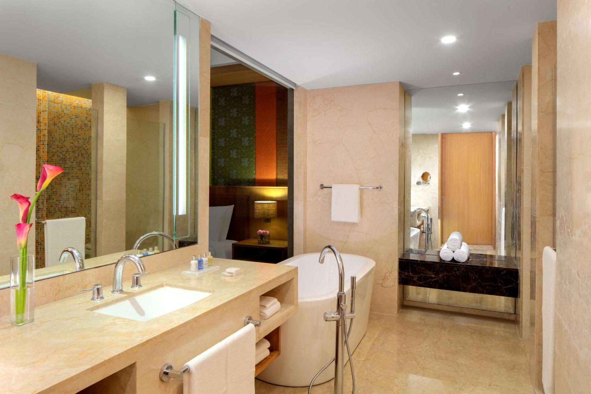 Junior Suite King Bed Bath tub Lake View Lounge Access Complimentary One Way Airport Transfer 2 Pcs Complimentary Laundry on Food & Soft Beverages Pick up drop from Kamakhya Temple,1278783499:JPEG
