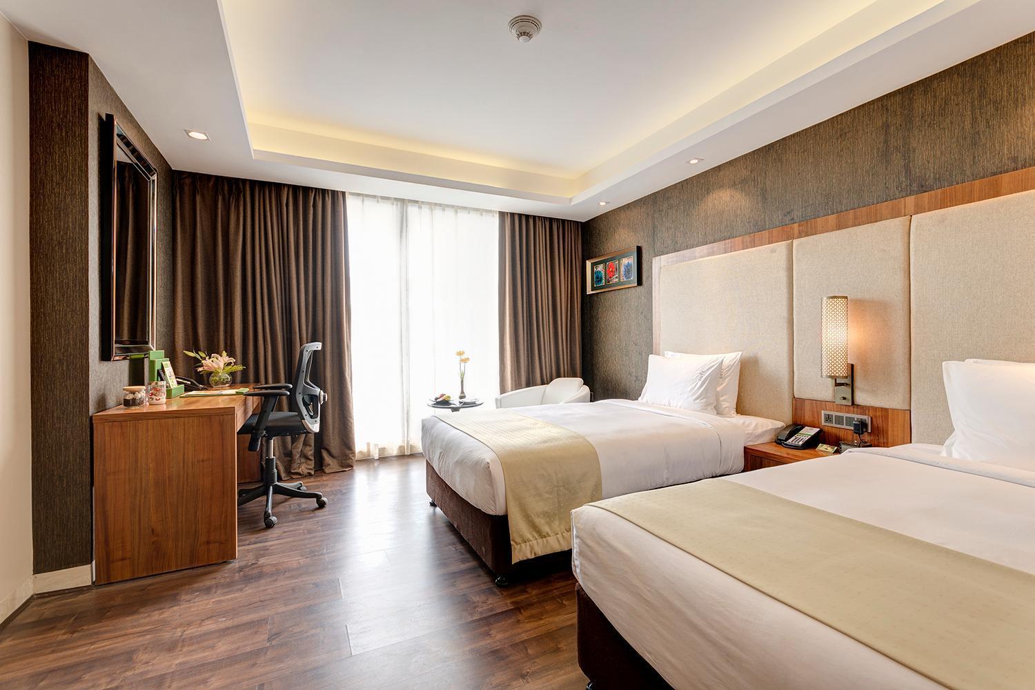 Standard Twin Room with Walk-In Shower - Enjoy 20% savings on Food & Beverages (soft), Happy Hours: Buy 1 Get 1 on IMFL (4PM – 8), Complimentary snacks with select liquor packages, Beer buckets starting from just ₹599, Special pricing on liquor bottl
