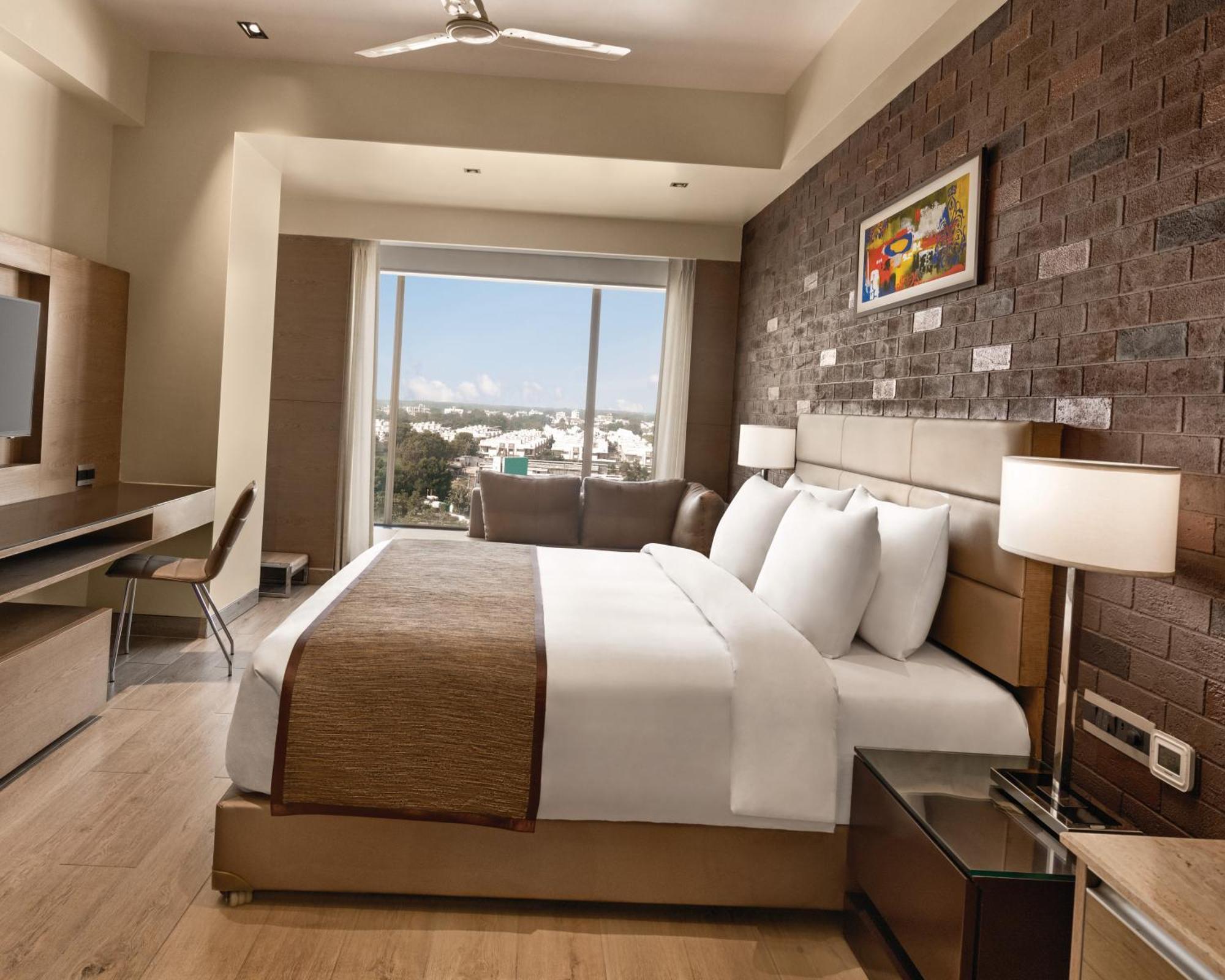 Deluxe Room with One King Bed and City or Garden View - Mobility Accessible/Non-Smoking - 15% Discount on Food & Beverages