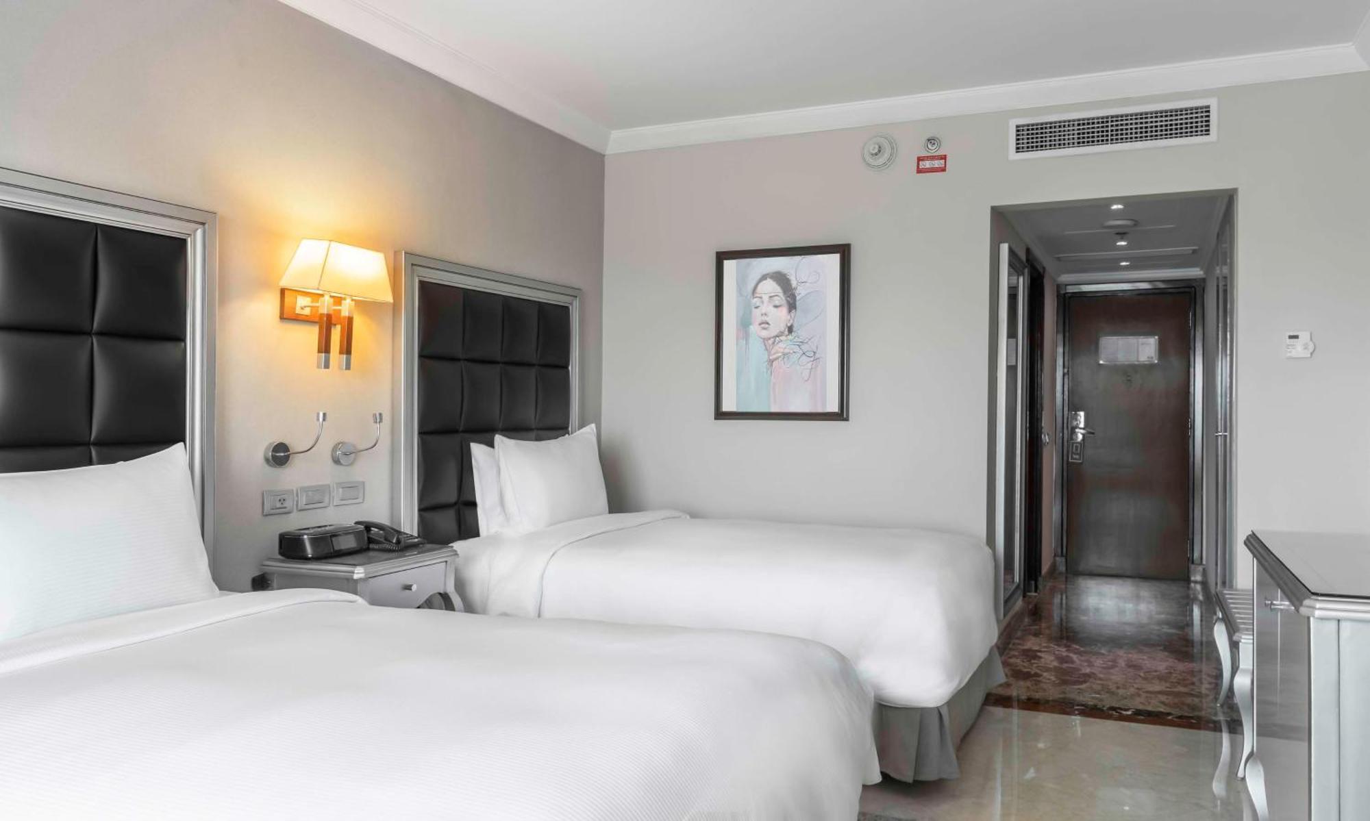 Twin Guest Room with Partial Sea View