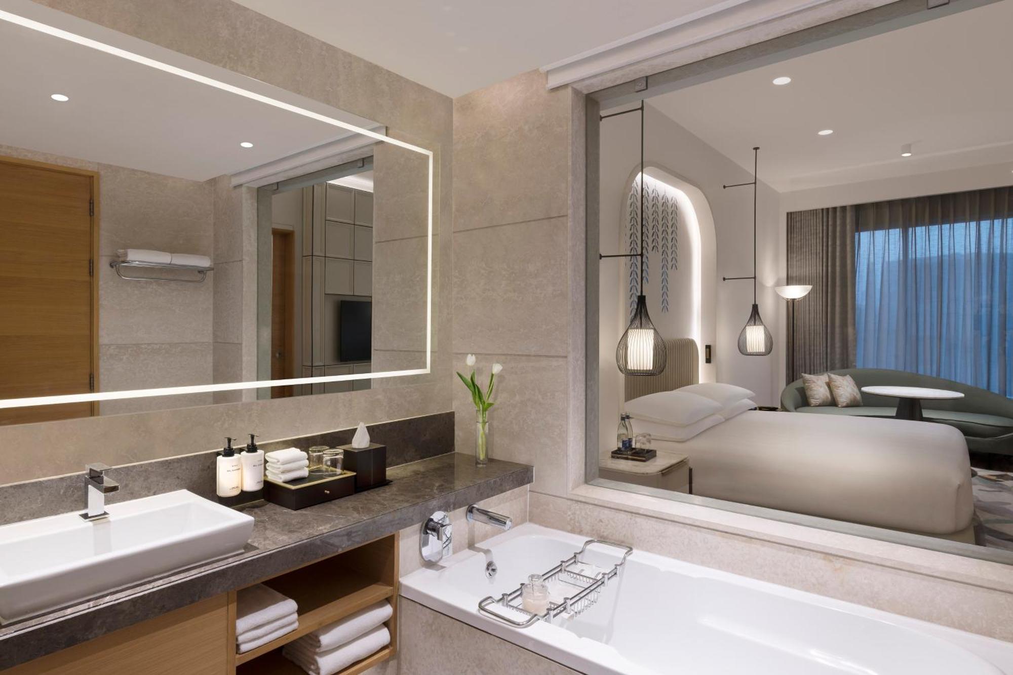 Junior Suite: 20% off on food,soft beverages, laundry & local transportation(upto 10 km); enjoy 90-min spa at 60mins spa price; BOGO offer on select beverages(5–8 pm) at Connexions Bar;3-course meal at House of Han-T&C apply