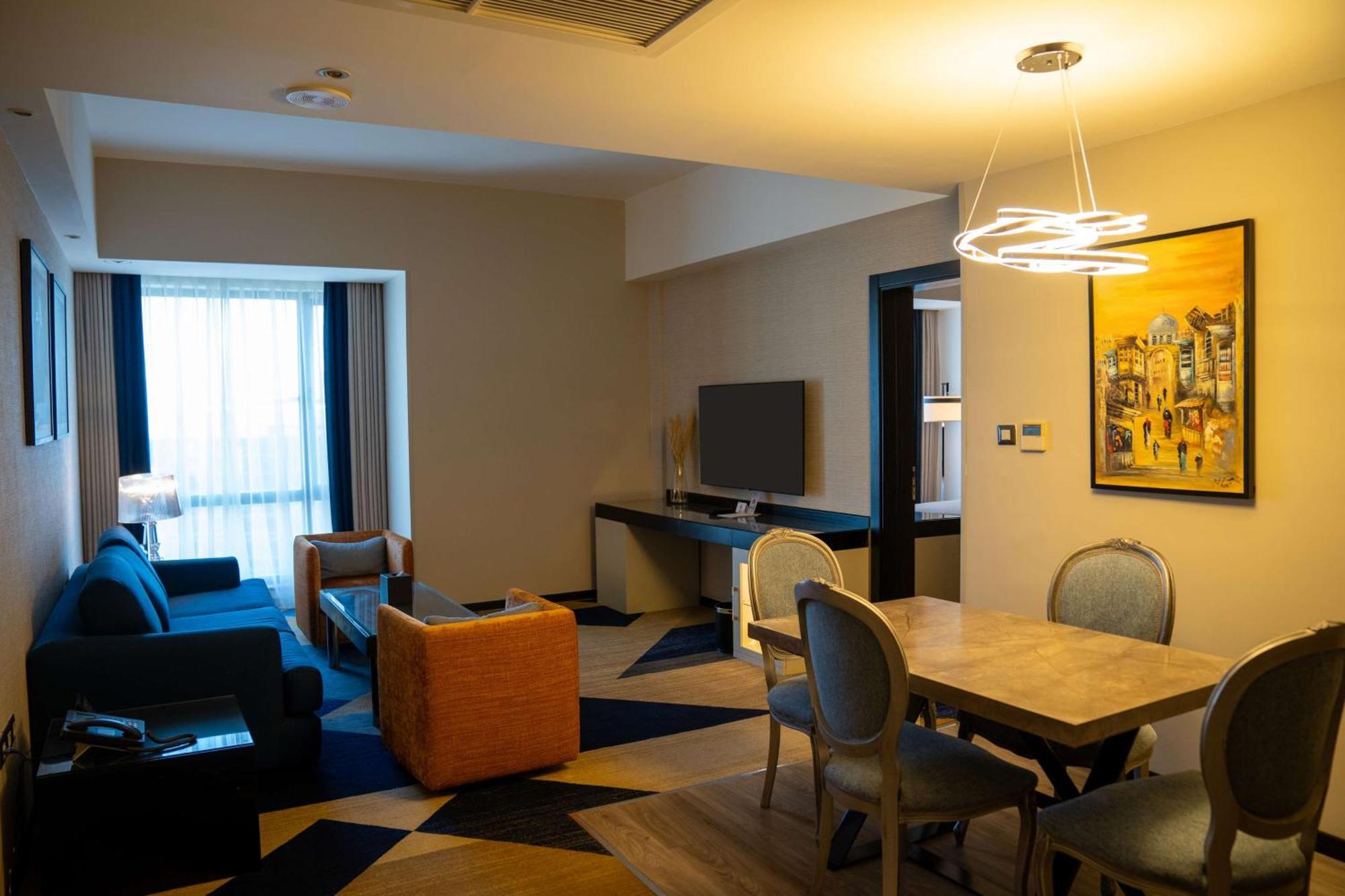 Two-Bedroom Suite with One King and Two Twin Beds