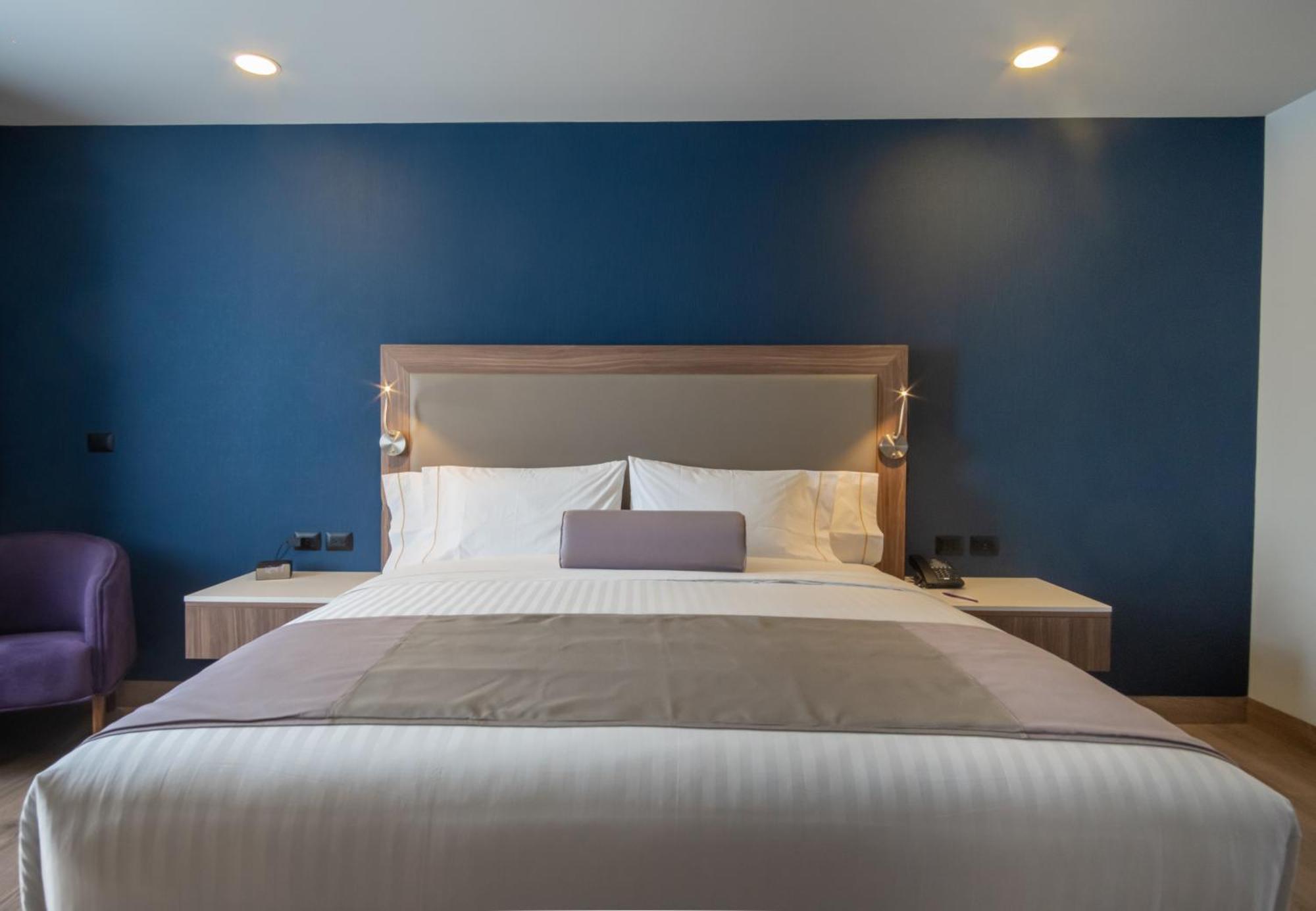 Deluxe King Room with City View and Balcony