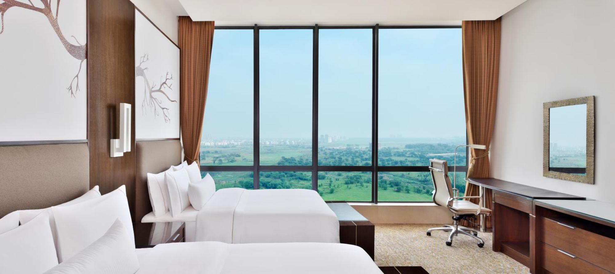 Club Twin Room Lounge Access 1 Way Airport Transfers F&B & Happy Hours 1 1 IMFL 4 pm to 8 pm at 31 or 32,1540931833:JPEG