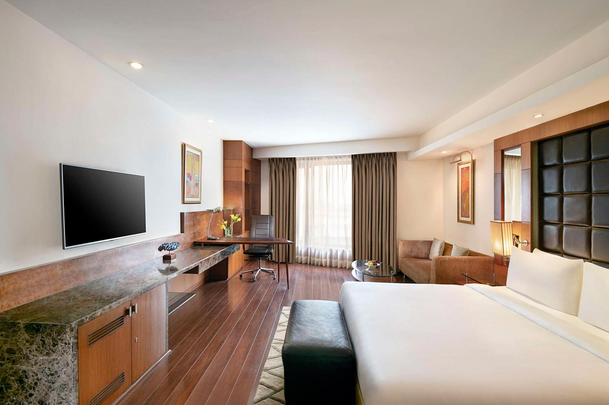 Deluxe Room Happy Hours 0100 PM to 0600 PM one way Airport Transfers Pick up drop to Worldmark Aerocity subject to car availability,1695747668:JPEG