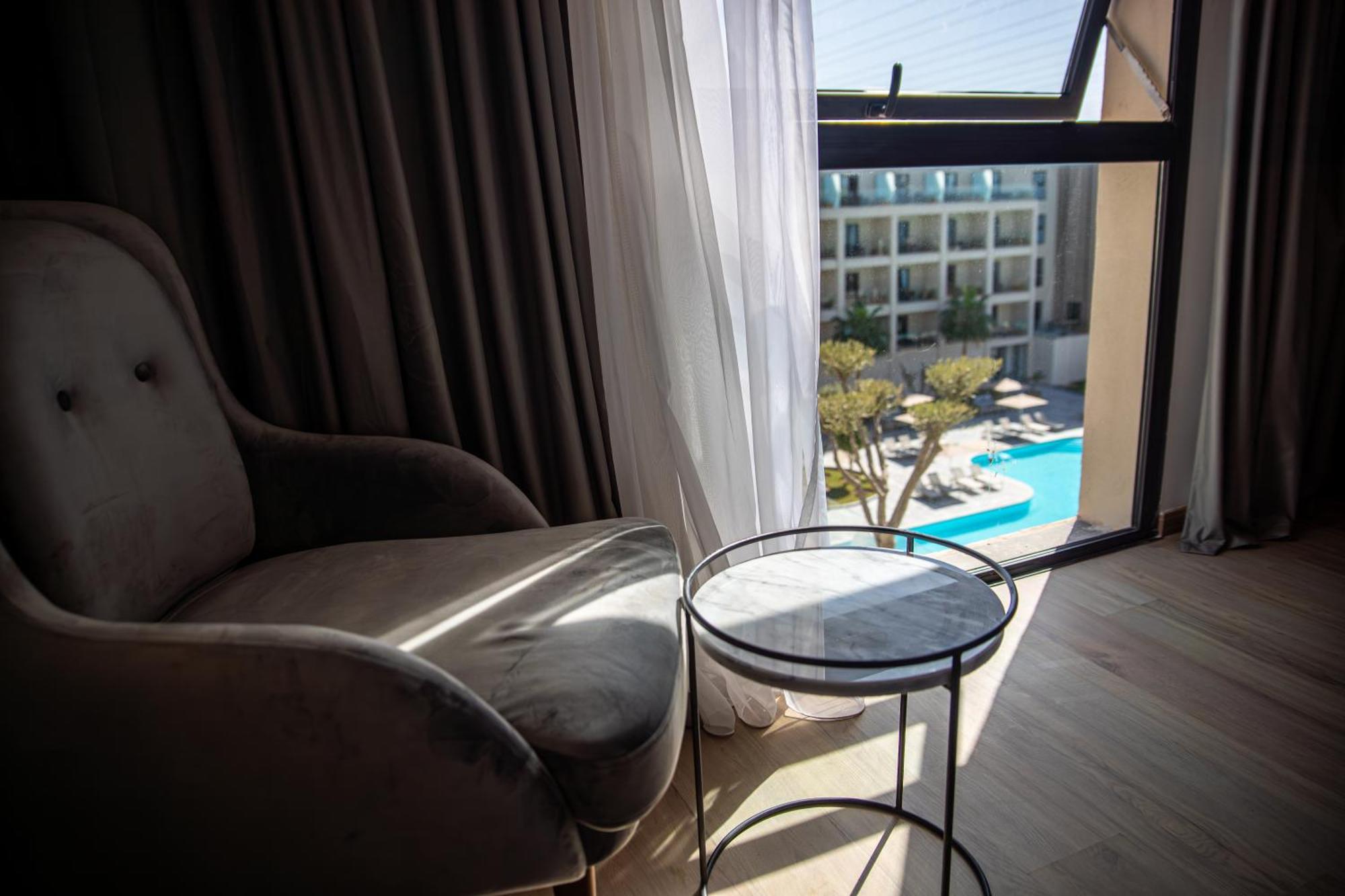 Standard Room Pool View,1565116276:JPEG