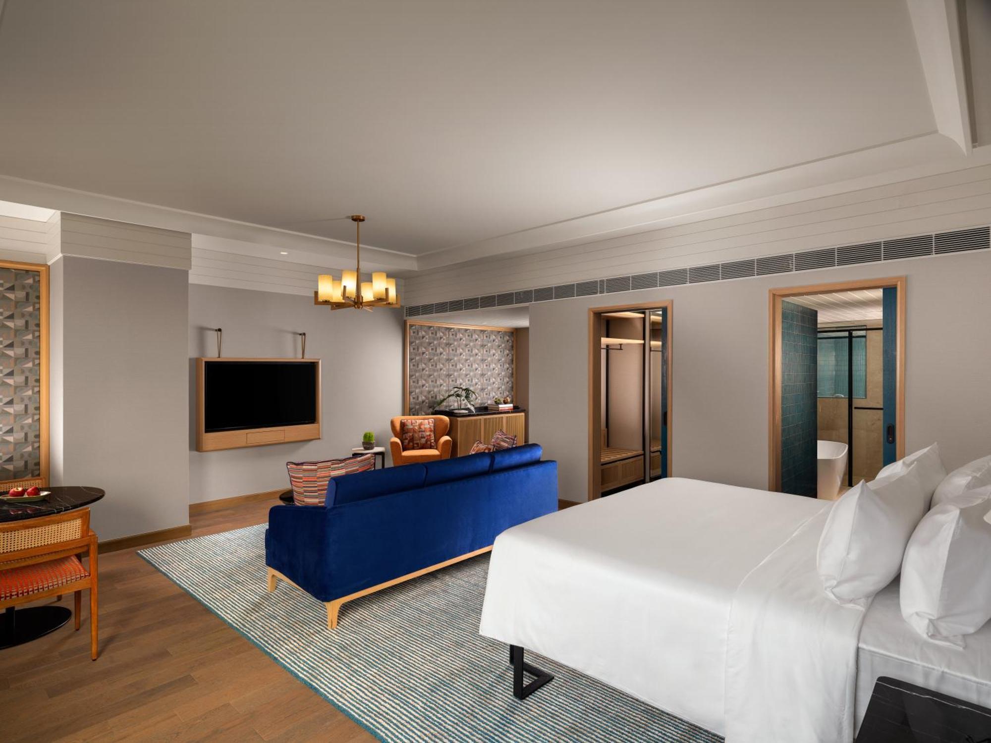 Superior Suite 1 King Bed - Lounge Access with Cocktail hours and One Way Airport Transfer