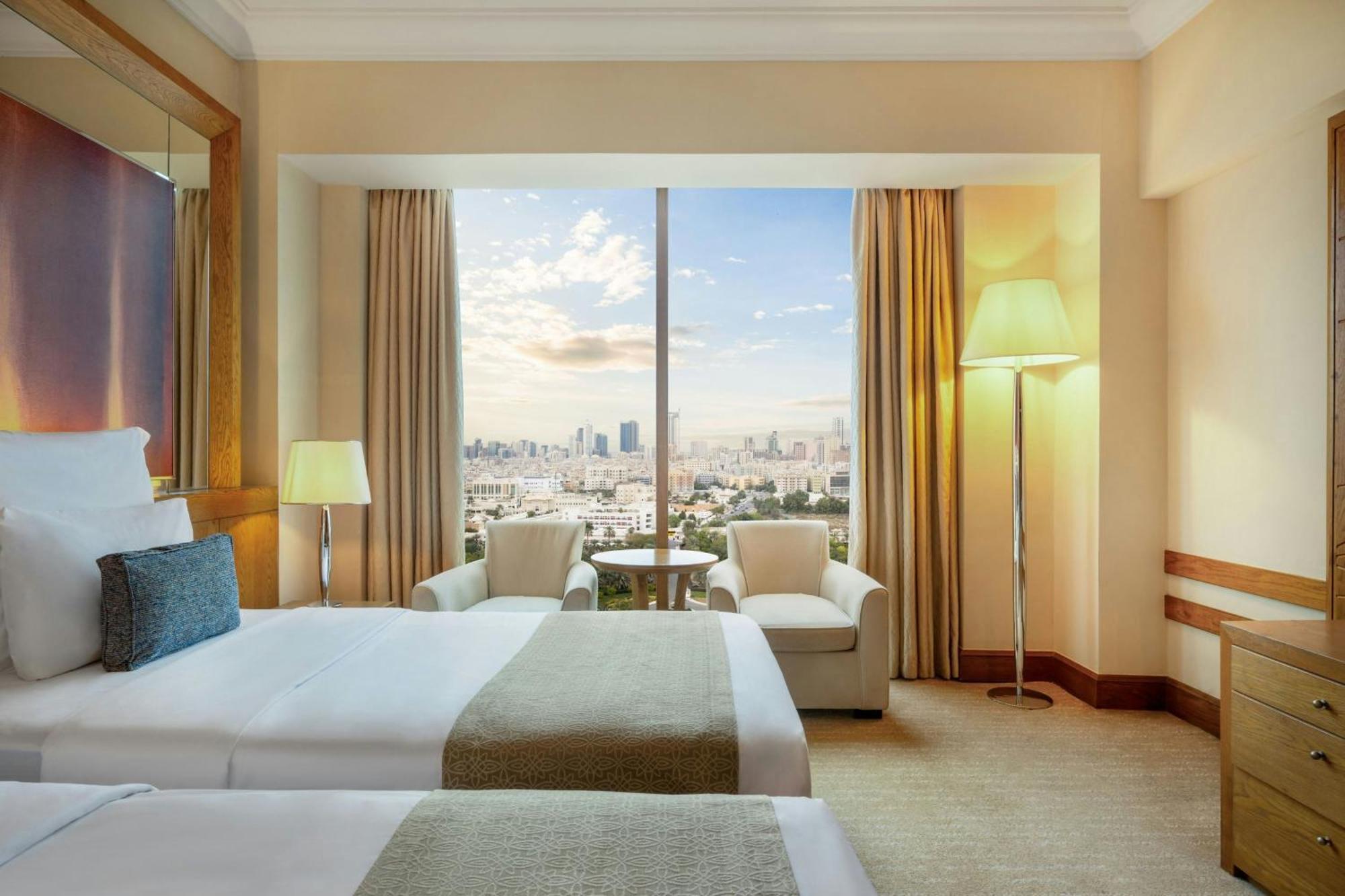 Luxury Twin Room with City View - Guaranteed 3pm Late Check Out and 20% Discount on F&B (applicable only on weekdays)