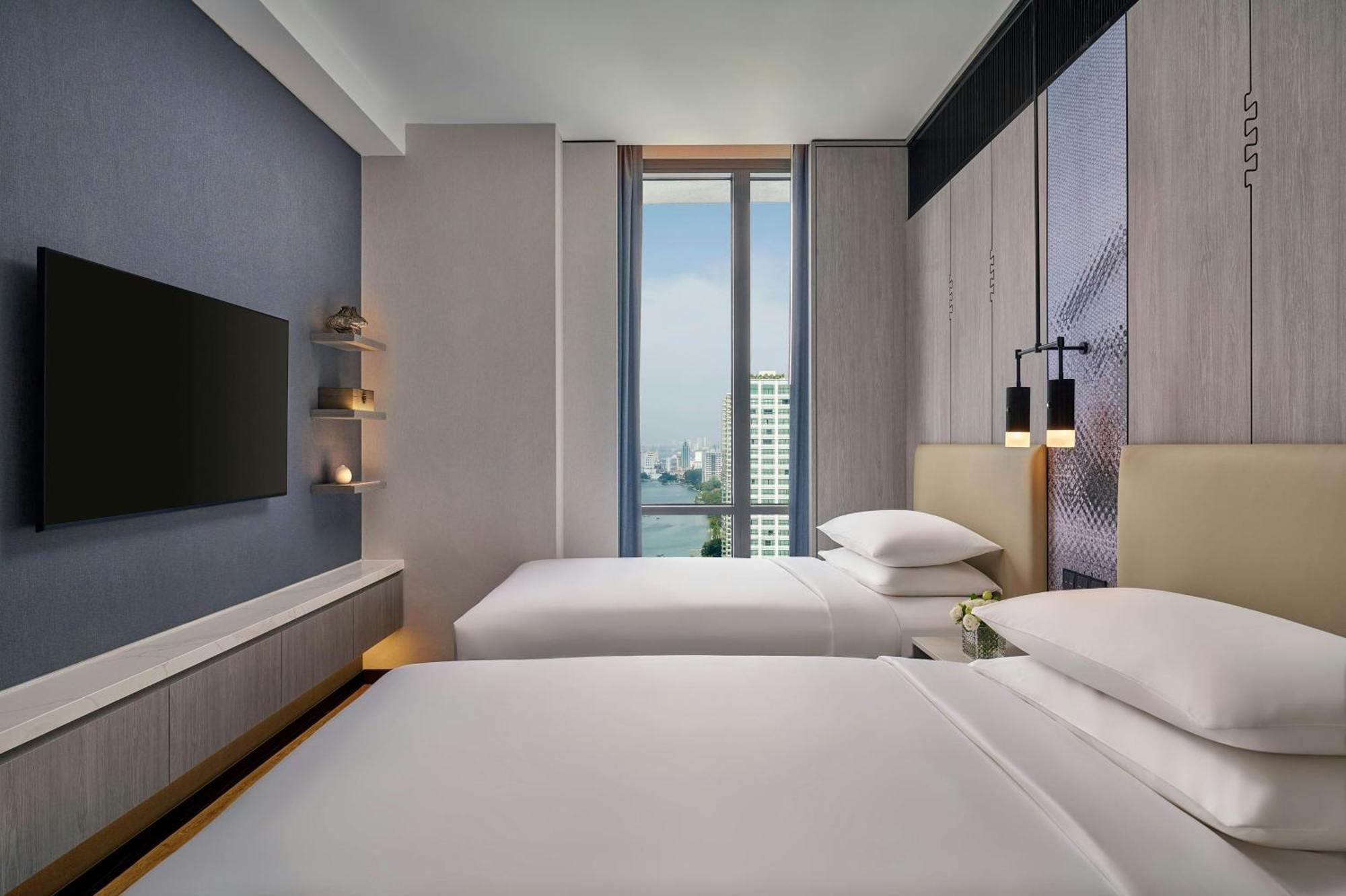 Two-Bedroom Family Suite with One King Bed and Two Twin Beds