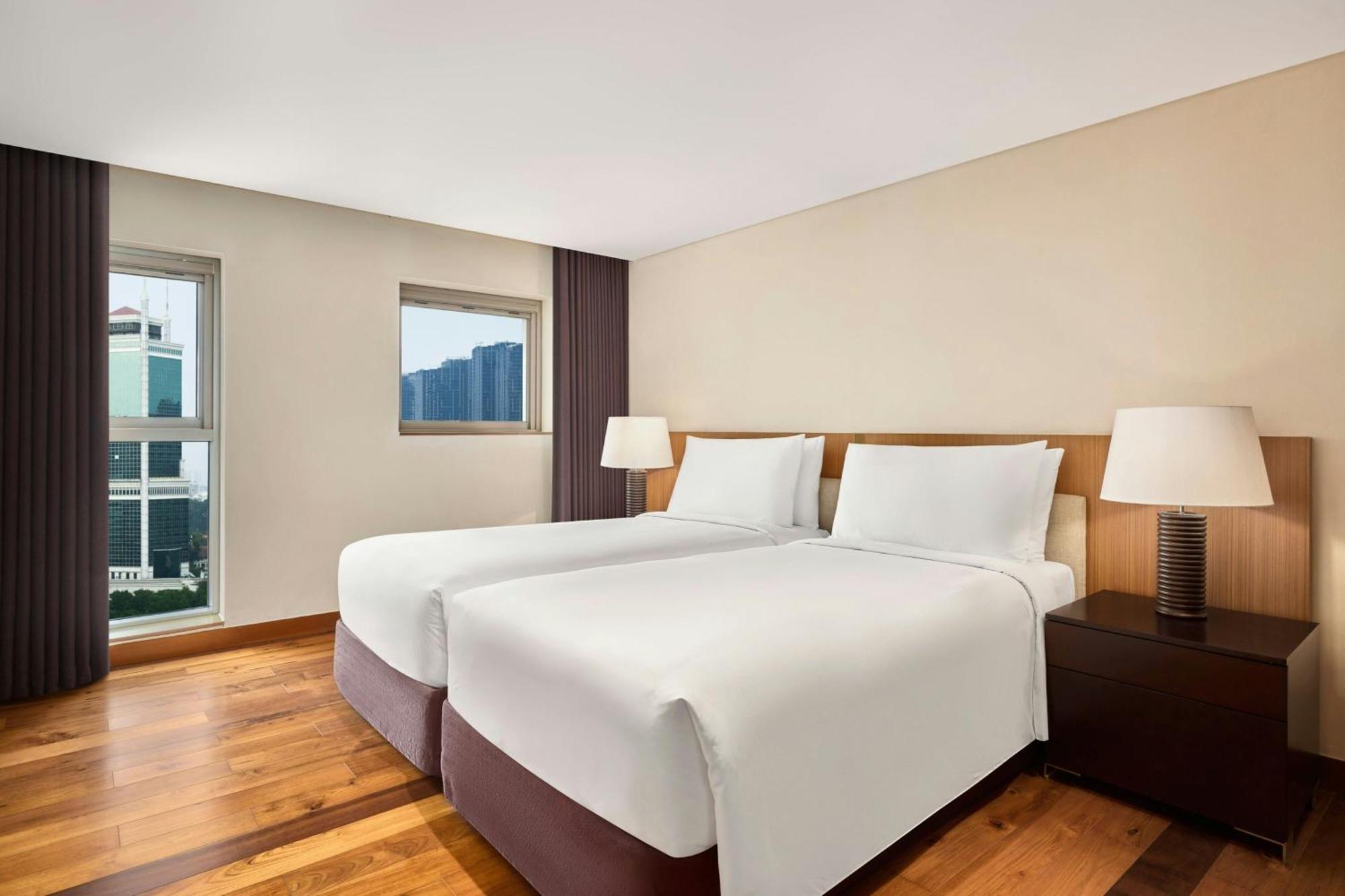 Two-Bedroom Suite with One King Bed and Two Twin Beds