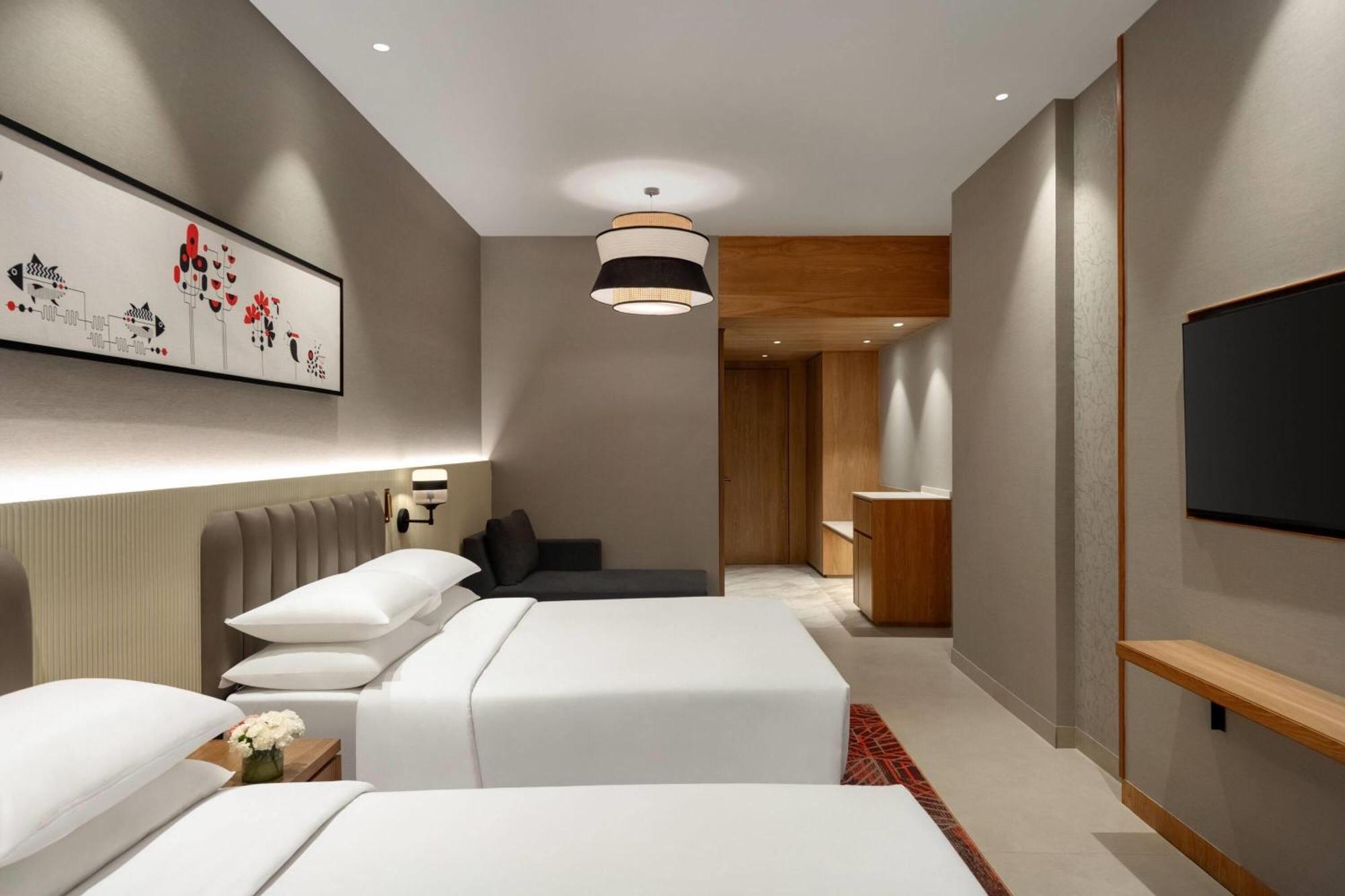 Deluxe Family Room with Two Queen Beds