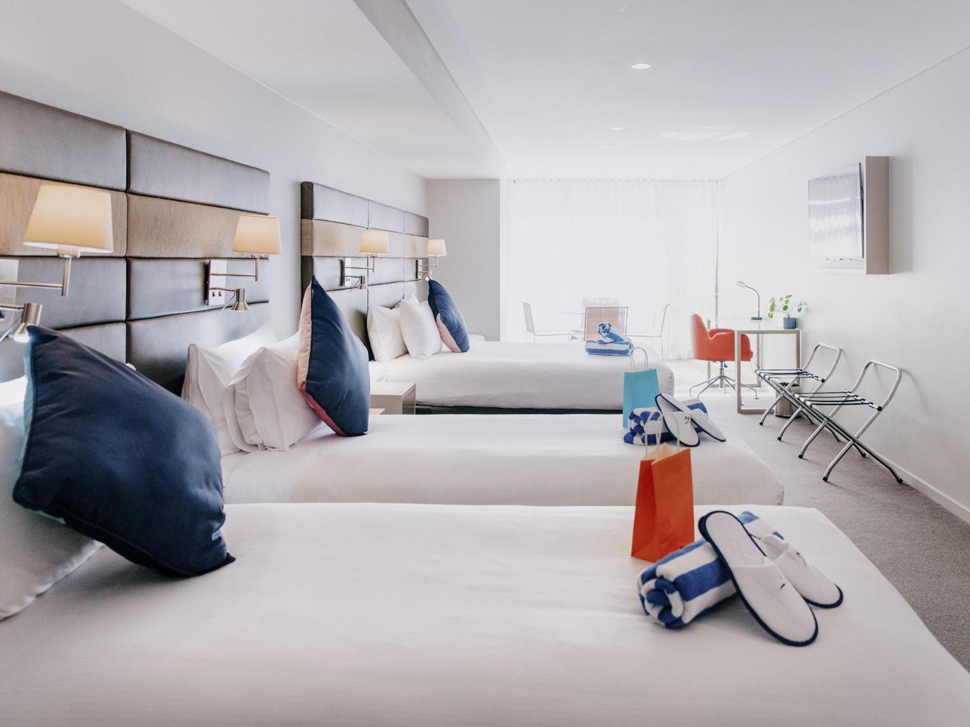 Superior Family Room with One Queen Bed and Two Single Beds - Accessible