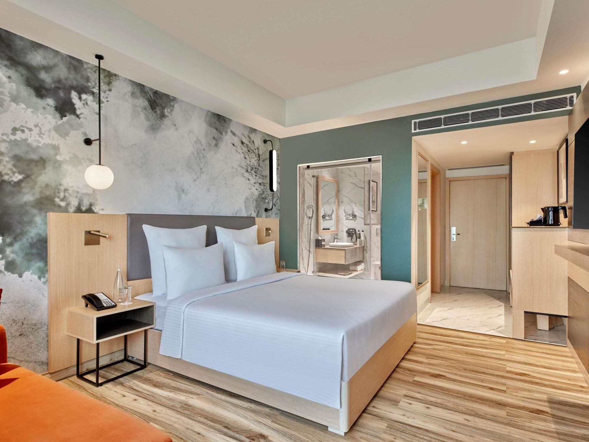 Executive Room with One Double Bed - Non Smoking/Pool side:Unlimited premium brands (6 to 8 PM) daily *, 1+1 on drinks (11 AM-7 PM), 15% Off on SPA, 15% off on Food and Soft Beverages, Free Gaming Zone access, Complimentary coffee&Tea (6AM-8 PM)