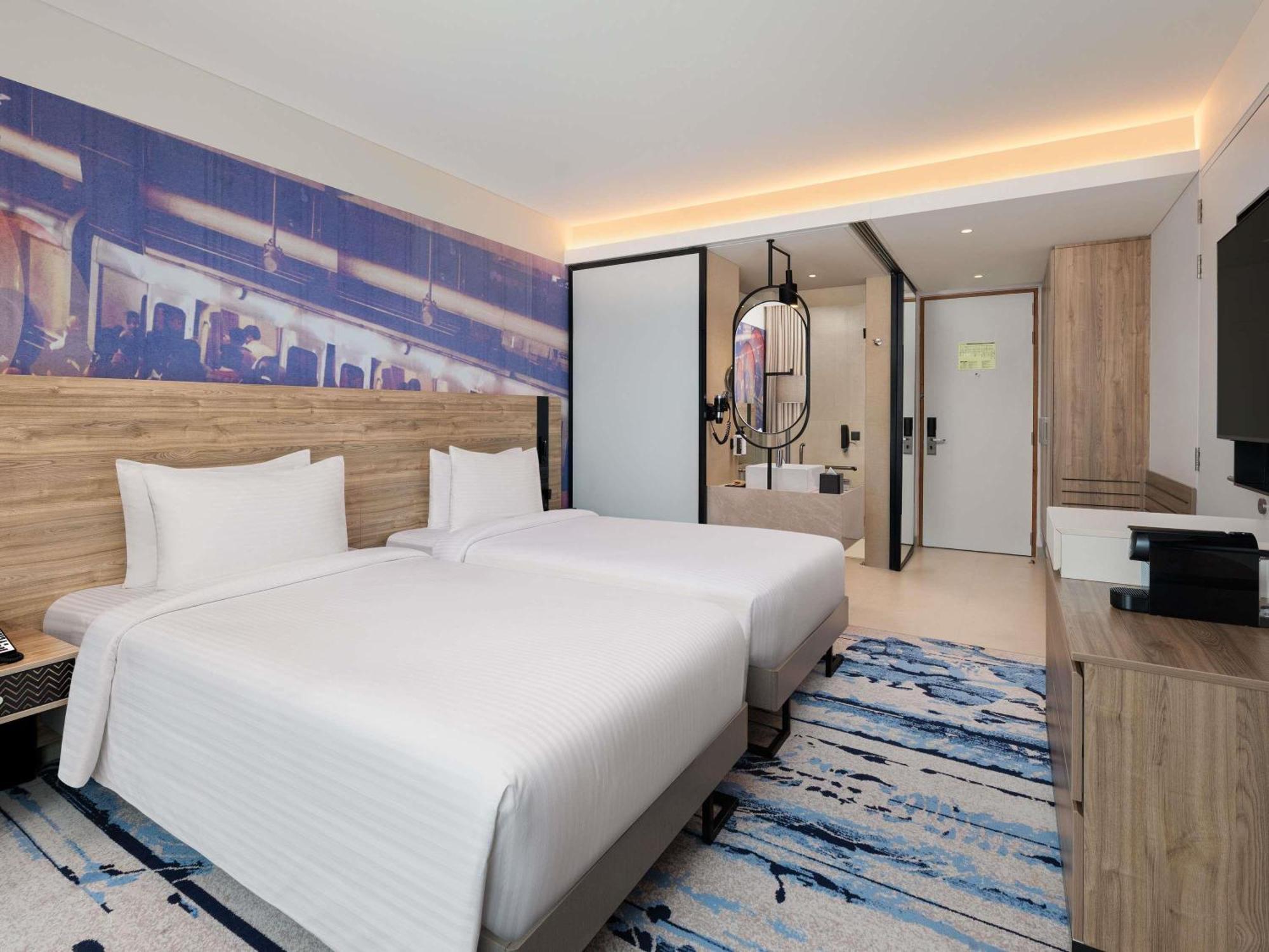 Executive Twin Room with two single beds- cocktail hours at Gourmet Bar,15%discount on F&B.