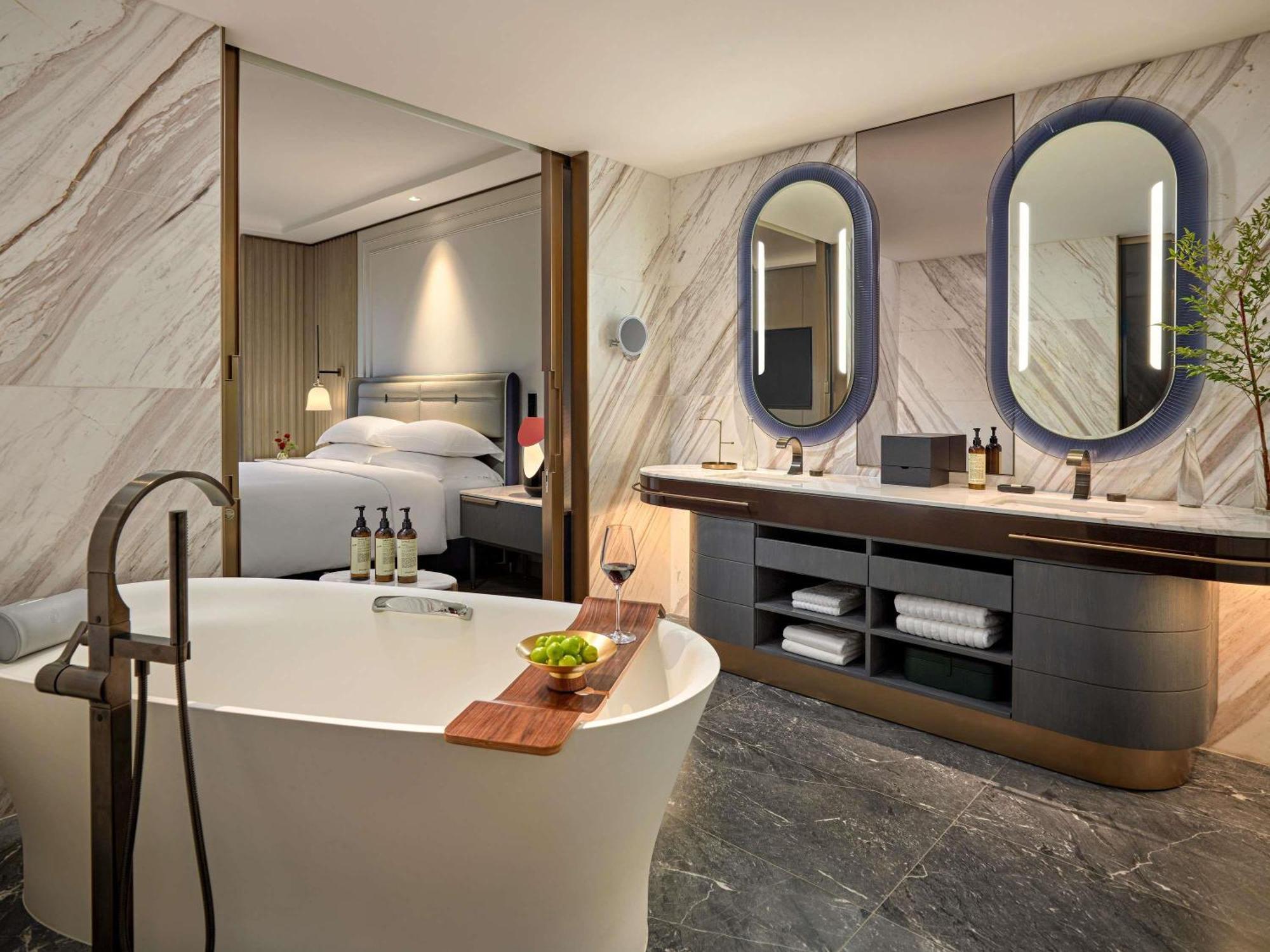 Two-Bedroom Premier Suite King and Two Single Beds - Separate Living Space