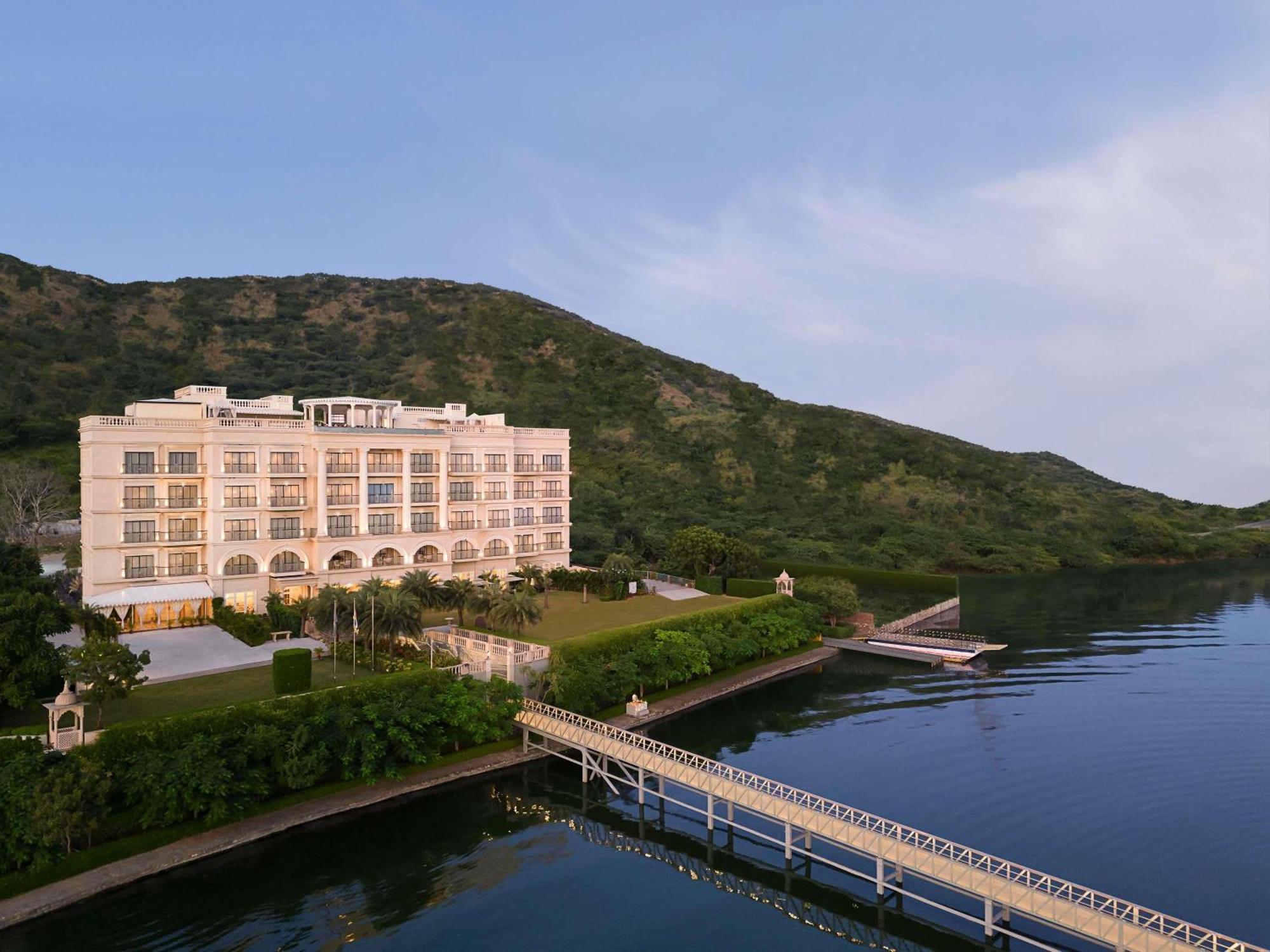 Raffles Lakeshore Manor Non-Island Suite: 20% off on Spa | Chef special arrival amenities | yoga experience | sacred Morning & Evening Aarti | curated walks, daily tea, bird watching, folk dance, Pottery, Mehendi,Astrology