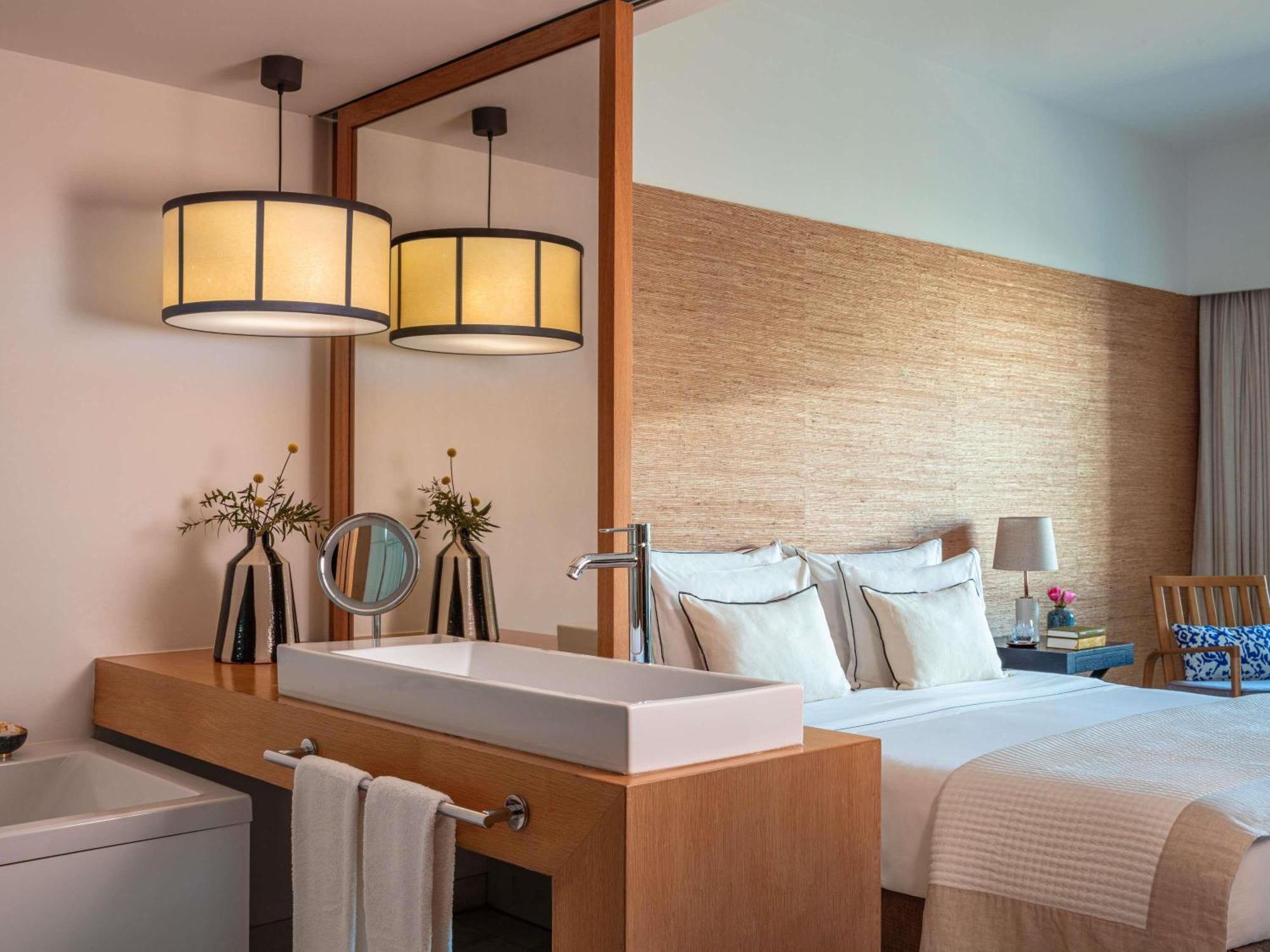One-Bedroom Suite with Palms Pool View and Balcony
