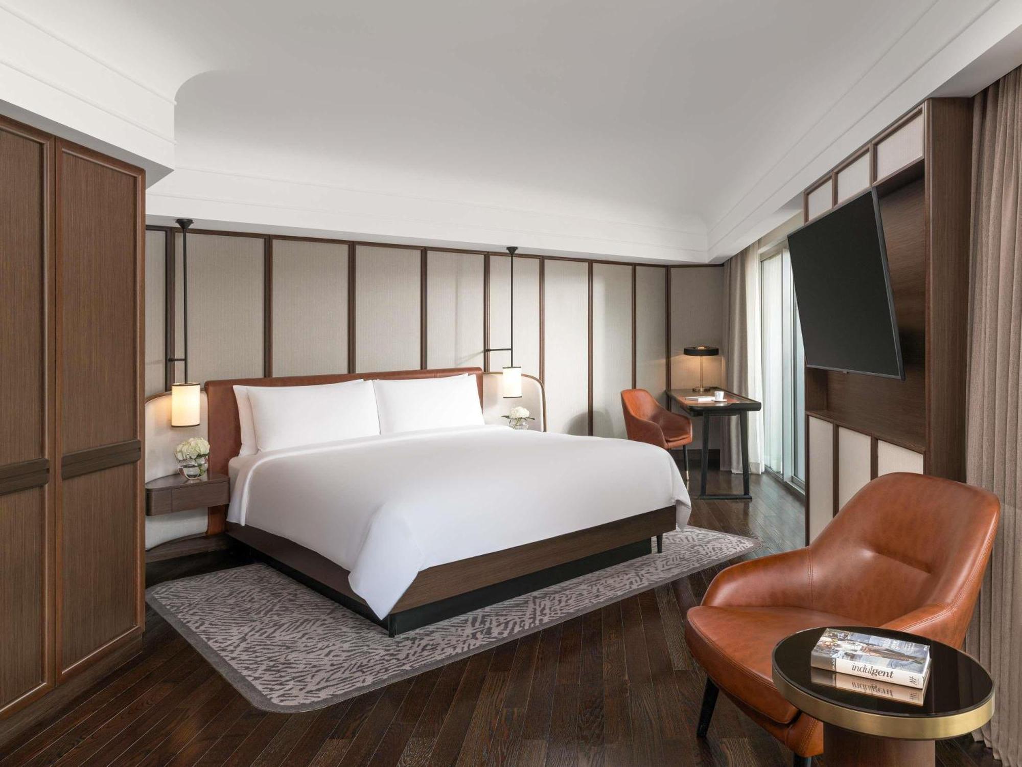 Signature Salon Suite met Kingsize Bed, Aparte lounge en 2 Balkons