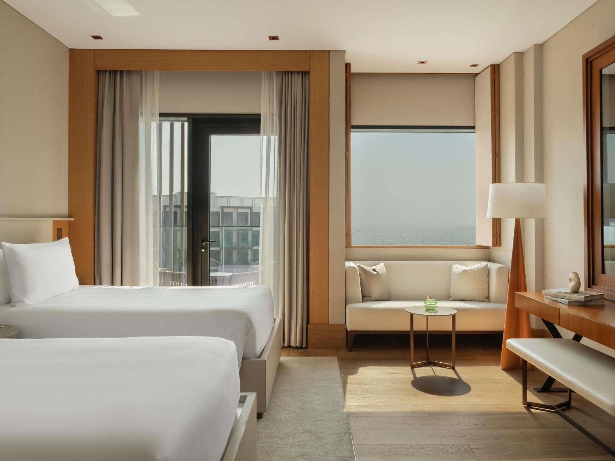 Rising Light Kamer met 2 Aparte Bedden en Uitzicht op Zee